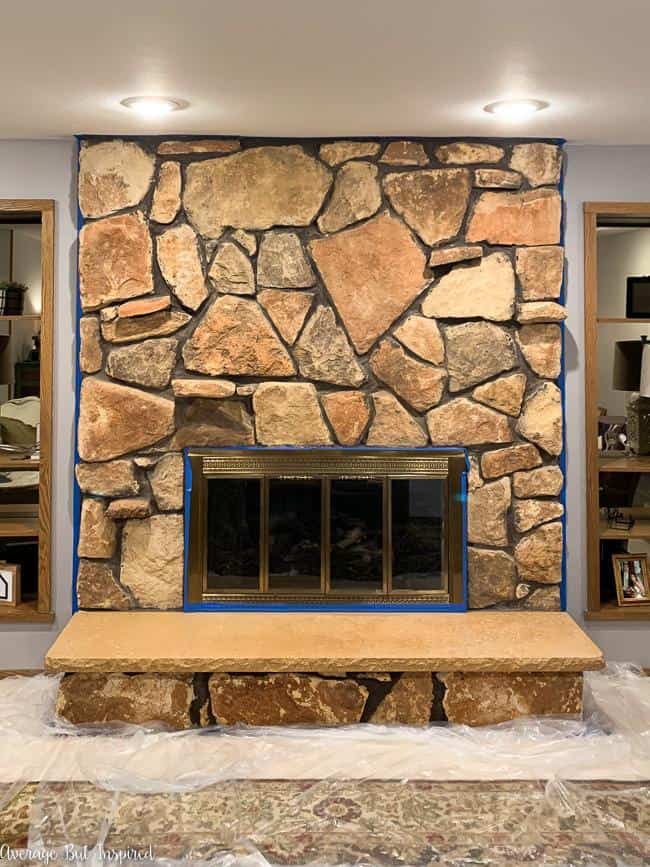 Limewash Stone Fireplace Makeover: Bye Bye Orange Stone Fireplace, Hello  Neutral Stone Beauty! - Average But Inspired