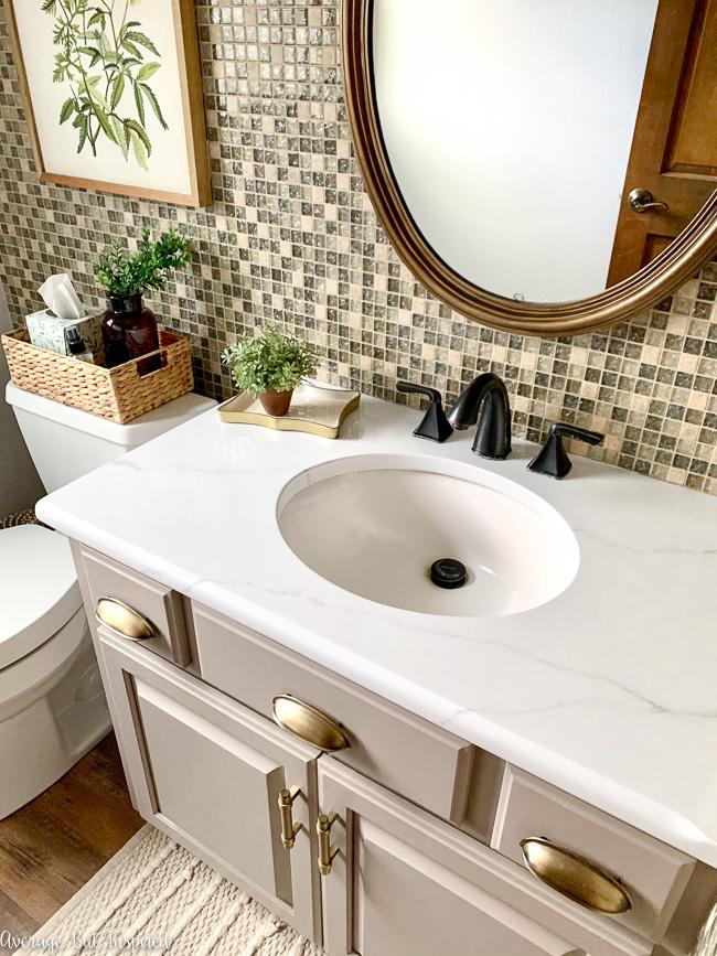 AMAZING! See how this blogger painted a countertop to look like marble! She transformed dark, ugly granite to look like marble over the course of a weekend!