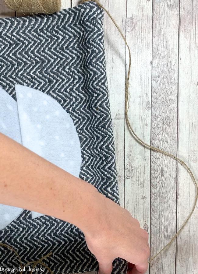 Create a boho wall tapestry with a dollar store rug!