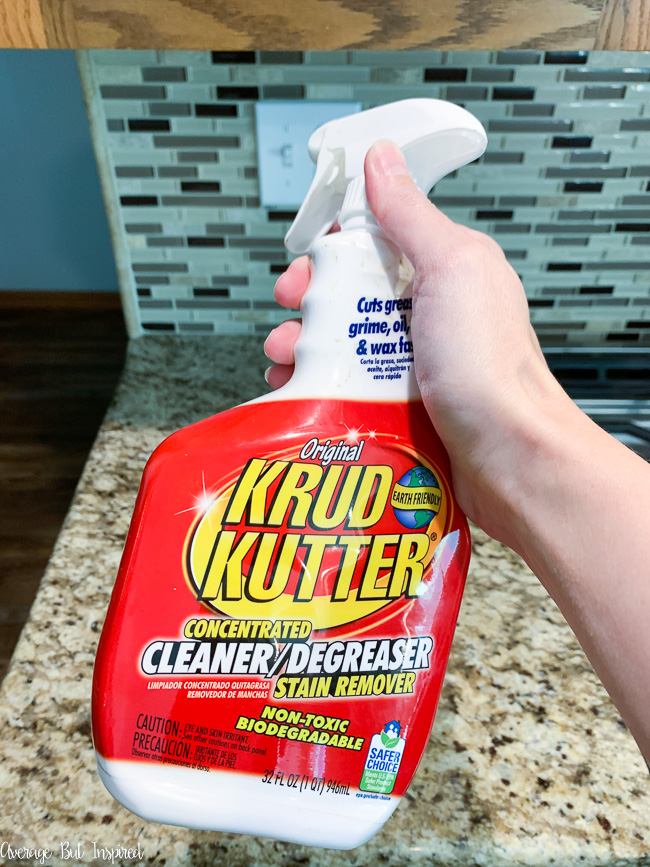 When painting a tile kitchen backsplash, it's important to clean thoroughly and remove all the grease. Krud Kutter is a wonderful pre-paint cleaner.