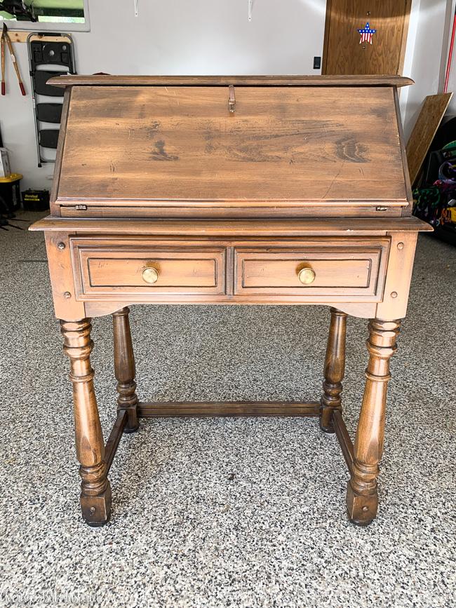 This small secretary desk got a classic makeover with black chalk paint. It's the perfect work from home desk for a small spot.