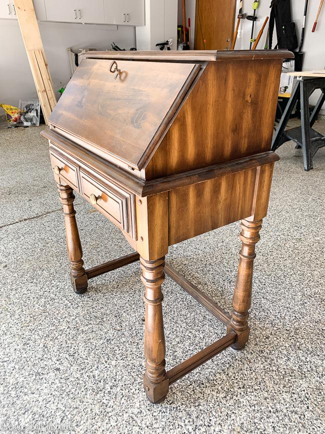 This small secretary desk got a beautiful makeover in classic black chalk paint.