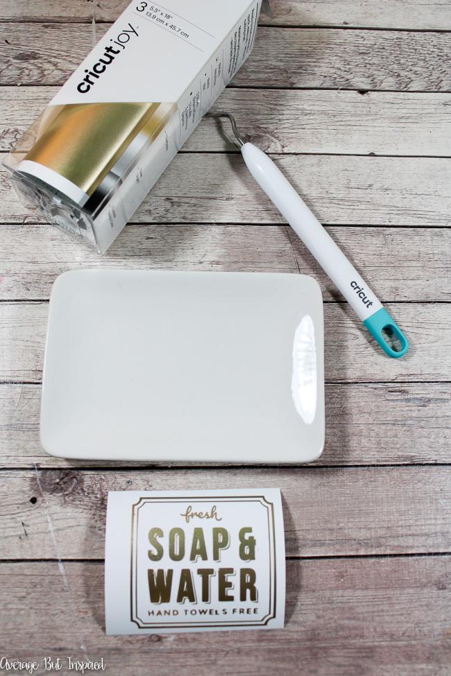 Add a "fresh soap & water" vinyl design cut on Cricut Joy to a dollar store soap tray to create a wonderful hostess gift.
