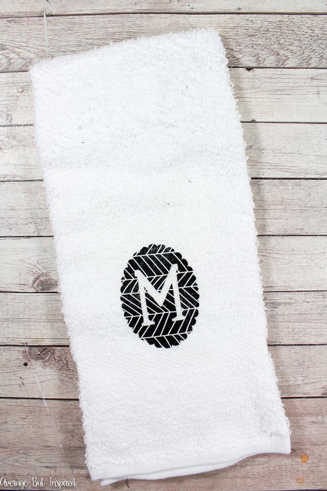 This dollar store hand towel got a custom monogram with Cricut Joy! It is part of an awesome dollar store hostess gift set.