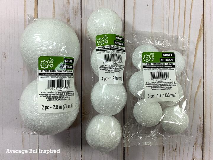 White floral foam balls form the base of DIY snowballs.