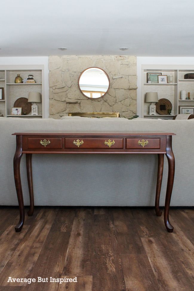 This Queen Anne sofa table in cherry wood got a beautiful, modern makeover!