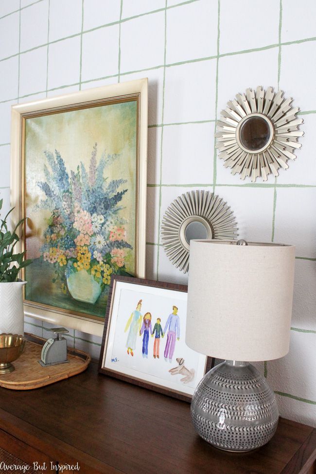Use leftover paint samples to paint a patterned accent wall in your home.