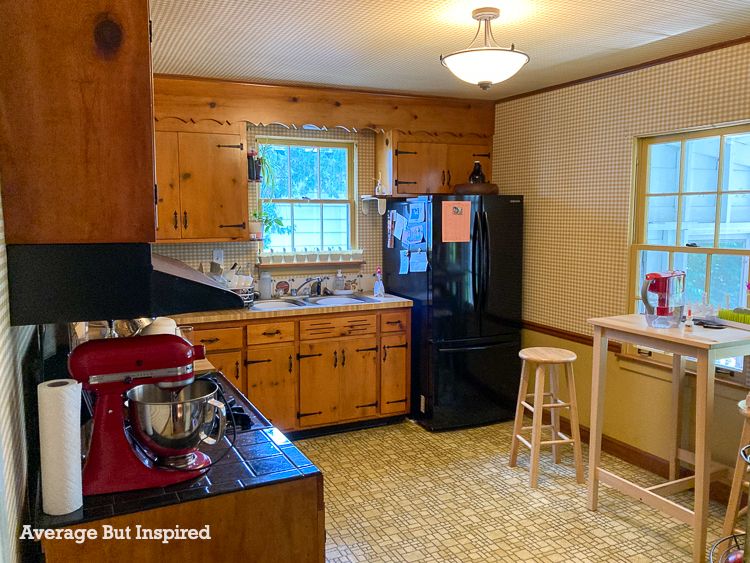 This 1950s kitchen was desperately in need of a remodel. The homeowners did a budget-friendly makeover with painted cabinets and more.