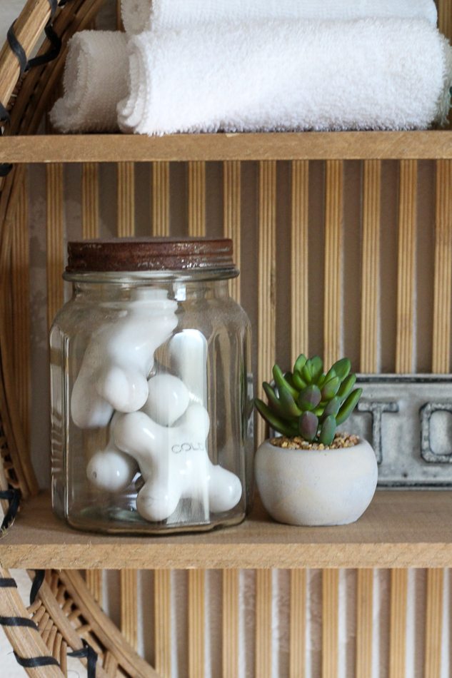 Bathroom accessories bring this vintage modern bathroom to life.