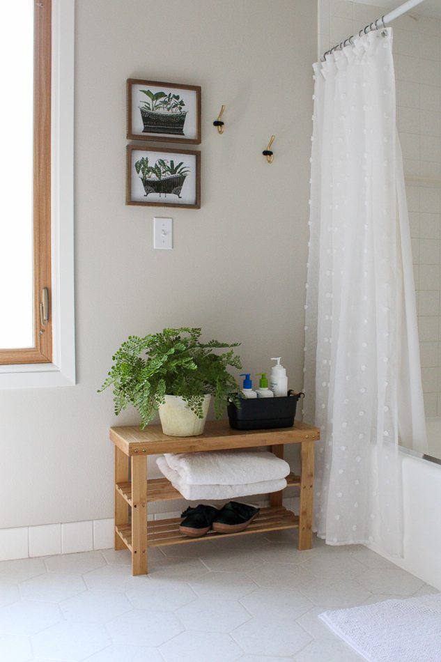 As part of this vintage modern bathroom makeover, she painted her bath tub!