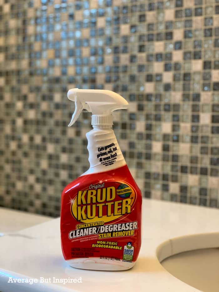 Before painting tile, clean it well with Krud Kutter or TSP.