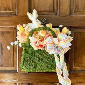A DIY spring wreath made from a moss purse. What a unique wreath idea for spring or Easter!