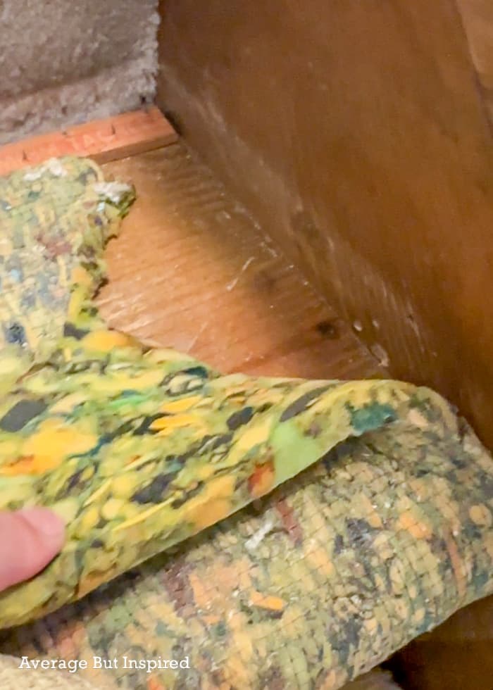 To remove carpet from stairs and refinish the staircase, pull the carpet from the corner.