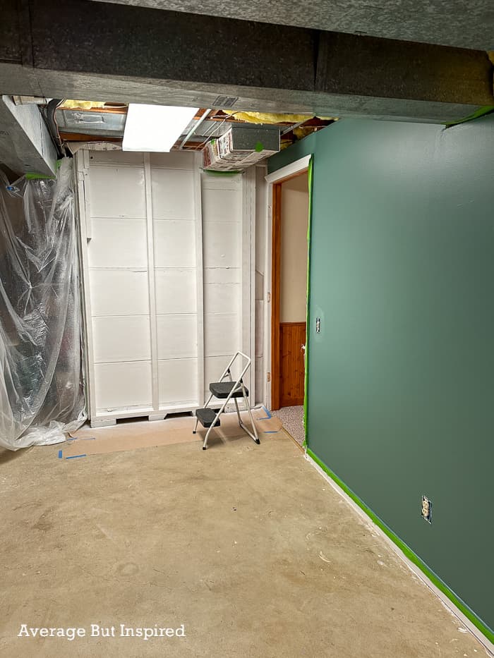 Part of converting an unfinished basement to a home gym was painting all of the walls.