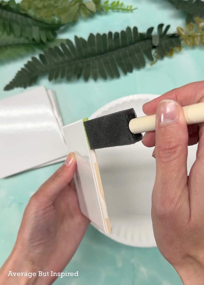 Paint the edges of the tiles with multi-surface craft paint.