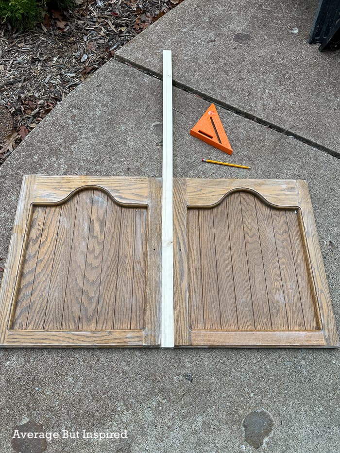 See how she repurposed cabinet doors and turned them into an adorable twin-sized headboard.