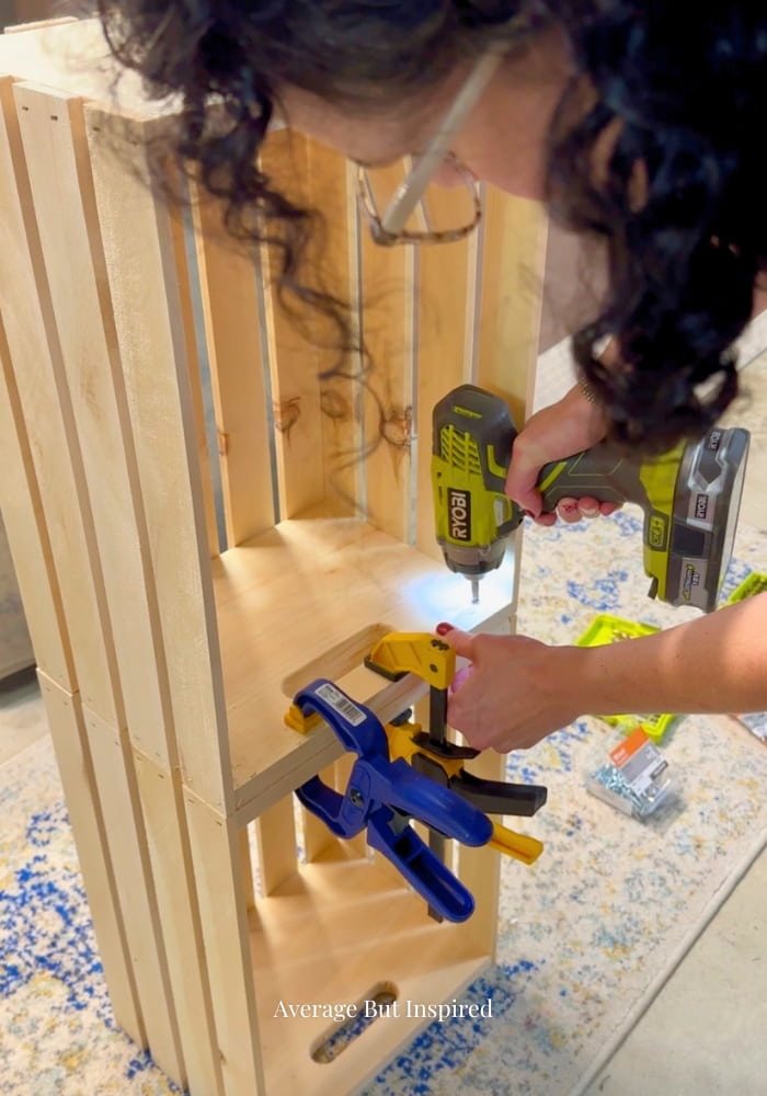 Building a rolling laundry folding station with wood crate legs.
